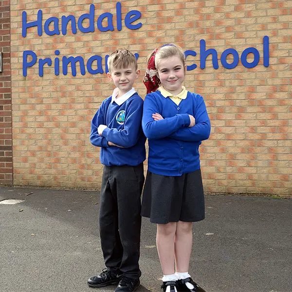 Four pupils sat together in the classroom