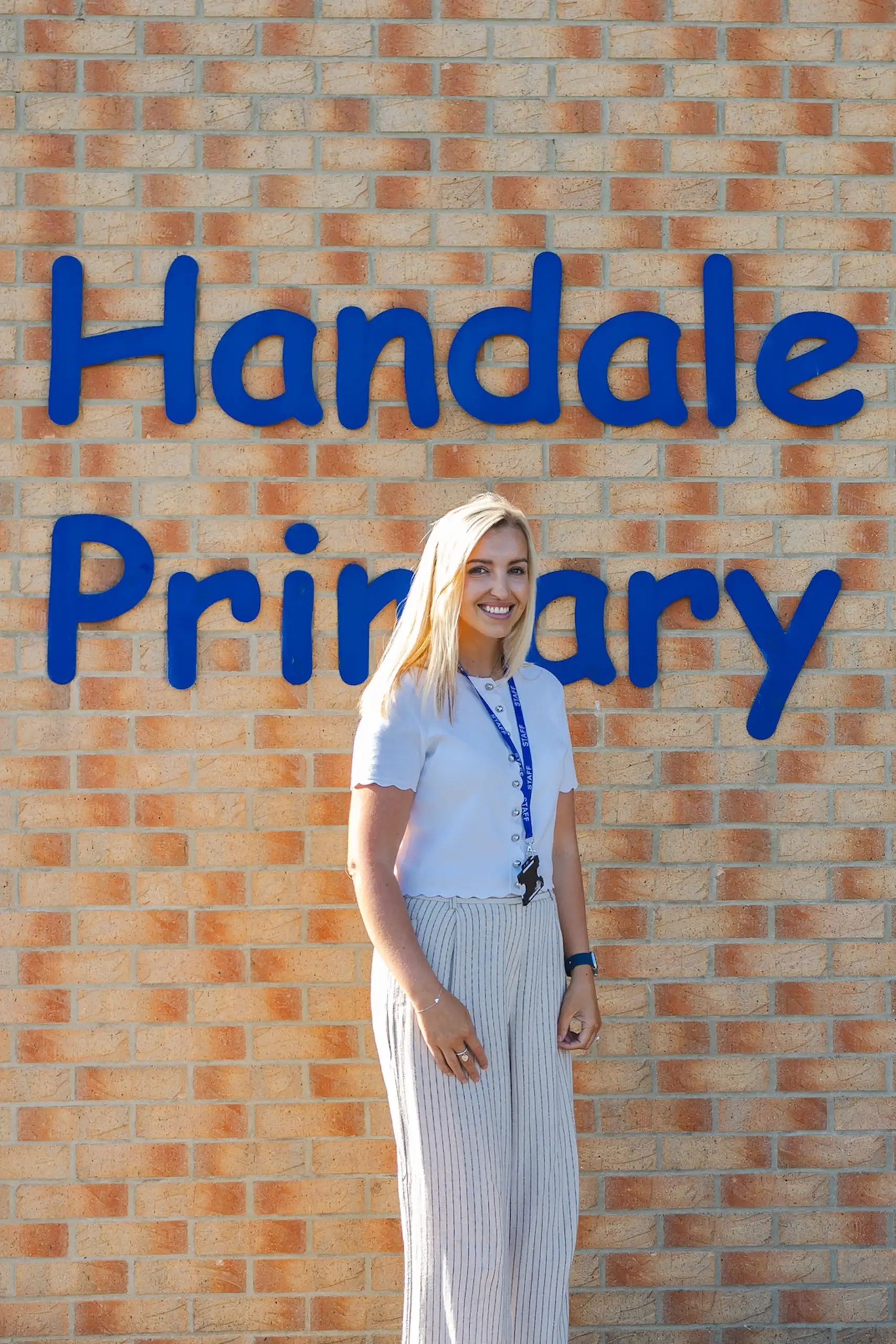 Picture of our Head Teacher at the front of the school