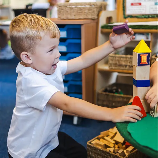 Boy at the school smiling